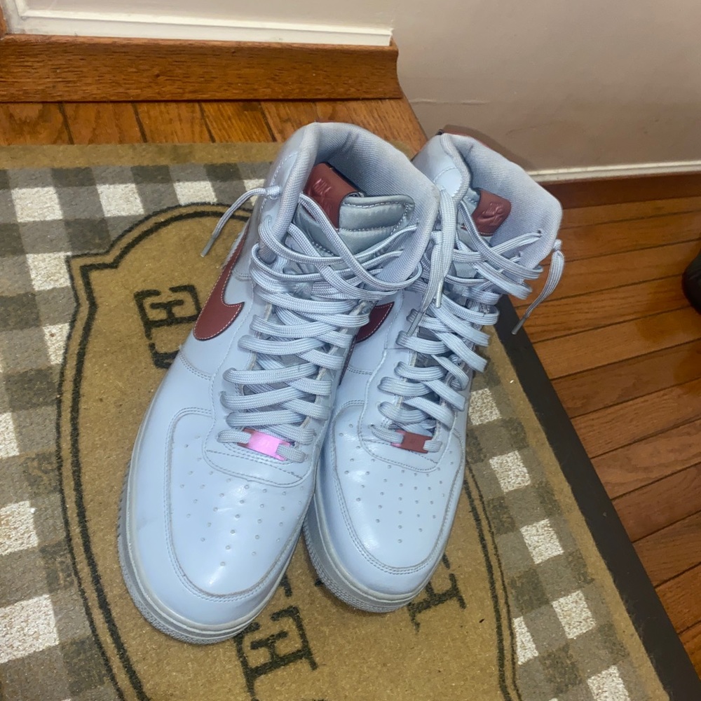 Grey Air Force 1s high